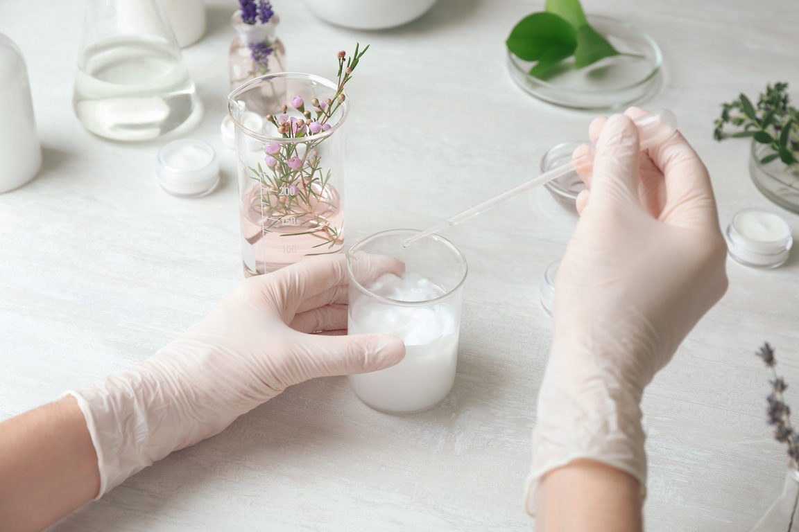 Scientist Developing Cosmetic Product in Laboratory, Closeup